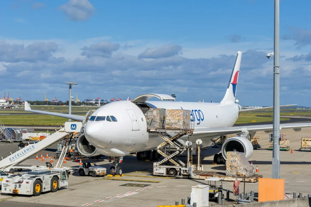 Cargo being loaded onto an aircraft on the airport apron