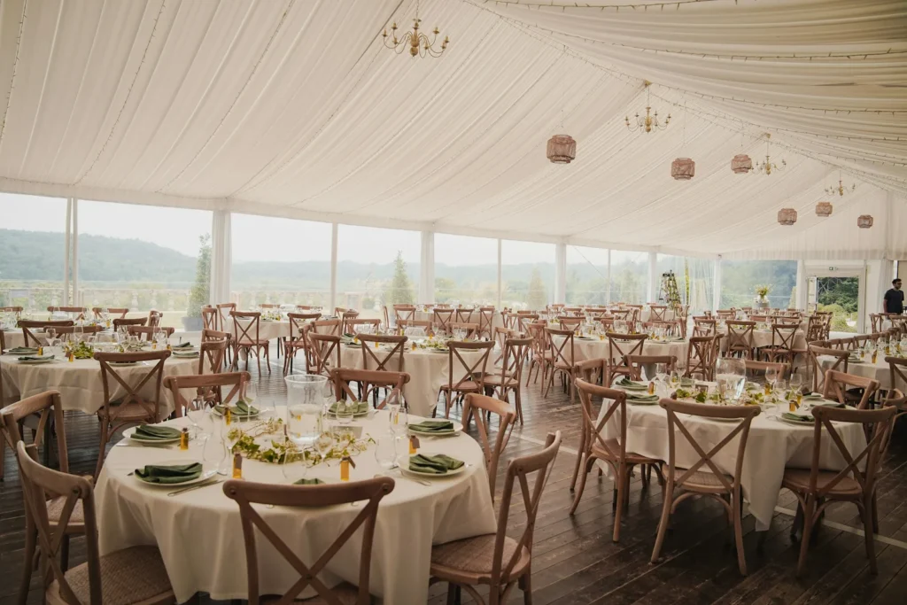 Event tent set up with tables and decoration